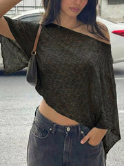 Sheer black one-shoulder cropped cardigan with a textured pattern.