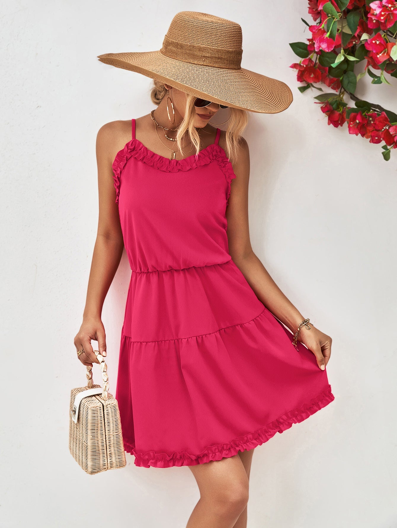 Hot Pink camisole tiered mini dress with ruffled trim and spaghetti straps.
