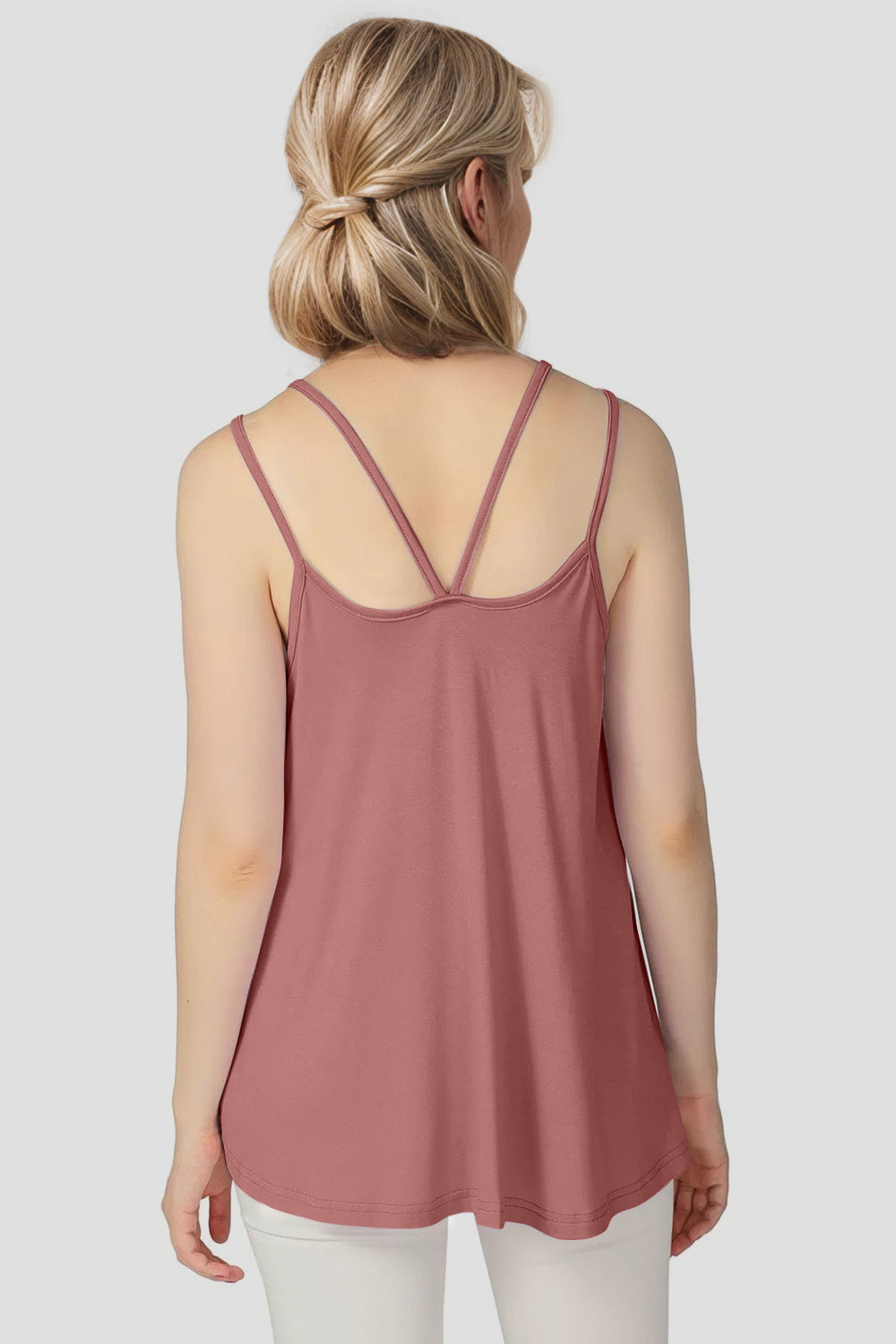 Double strap trapeze cami in dusty pink with crisscross back detail.