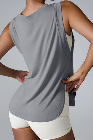 Charcoal grey performance tank top with asymmetric hemline and relaxed fit.