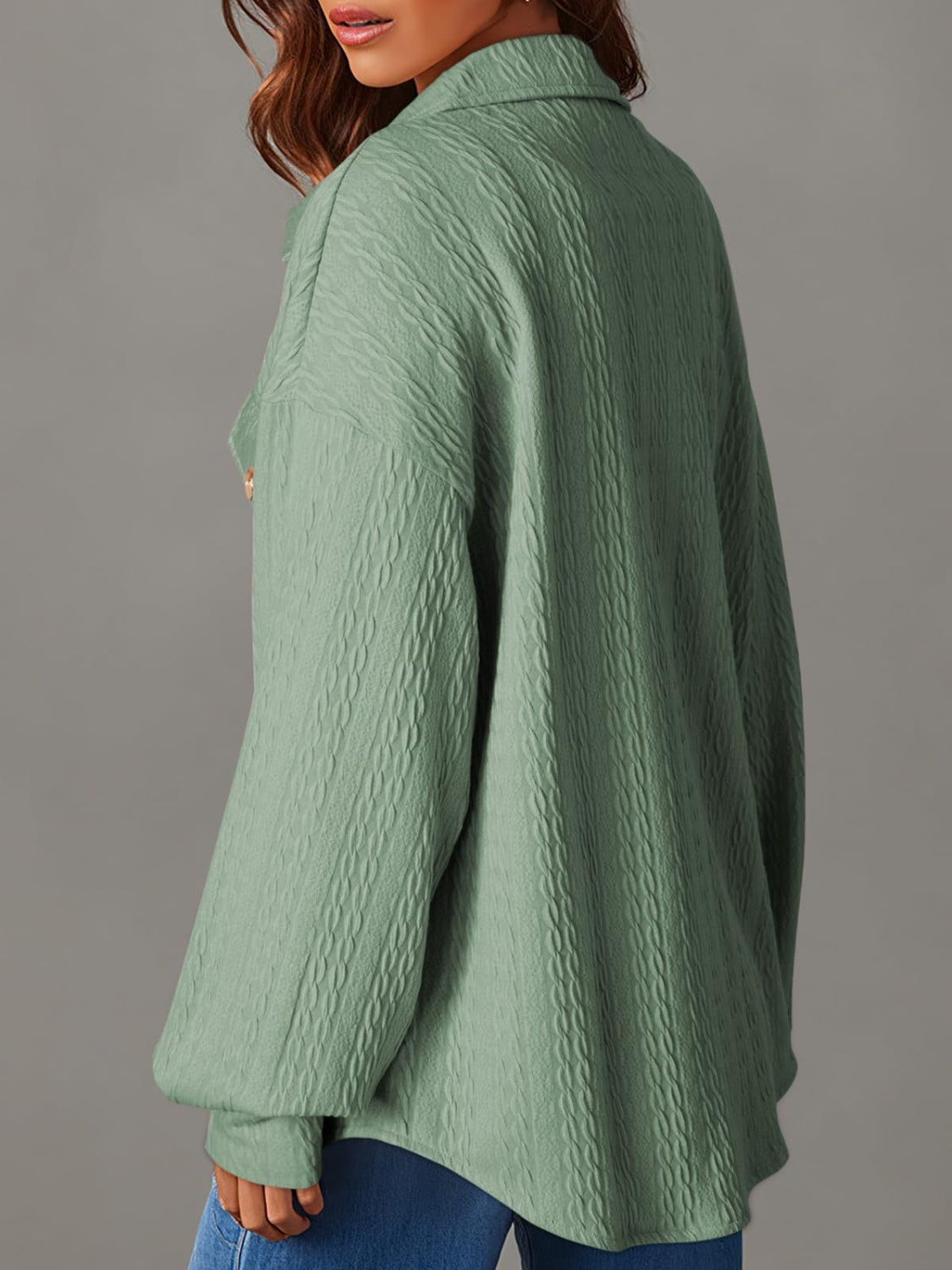 Textured oversized button-down shacket in Gum Leaf green with a textured pattern and button detail.