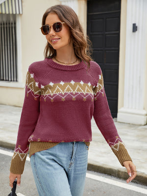 Fair Isle yoke knit sweater in cerise with a diamond pattern on the yoke and sleeves.