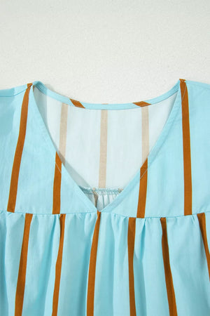 Light blue cotton blend blouse with brown vertical stripes and a V-neckline.