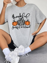 Oversized grey t-shirt with thankful graphic and pumpkins, crew neck, short sleeves.