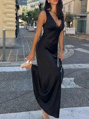 Black lace-trimmed sleeveless maxi gown with a V-neckline and cinched waist.