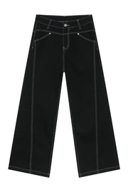 Black relaxed fit denim jeans with contrast white stitching and wide leg.