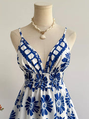 Floral v-neck mini dress with smocked waist and blue floral print