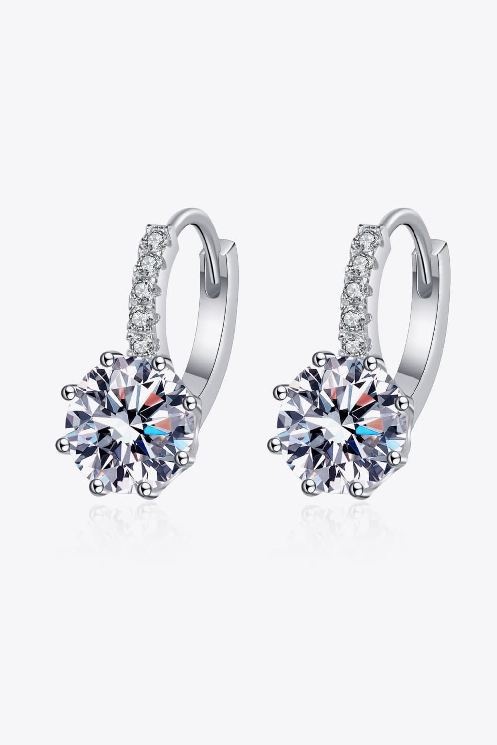 Moissanite halo hoop earrings in sterling silver with sparkling cubic zirconia accents.