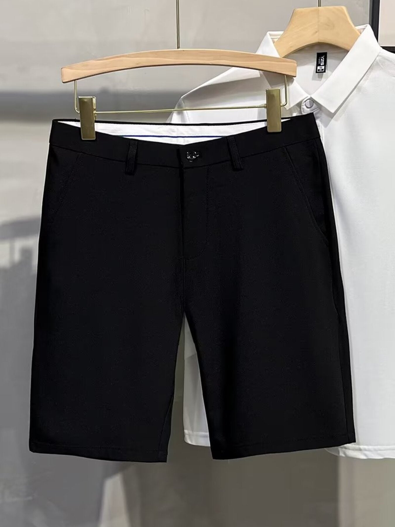 Men's black chino shorts with a comfortable fit and classic rise.
