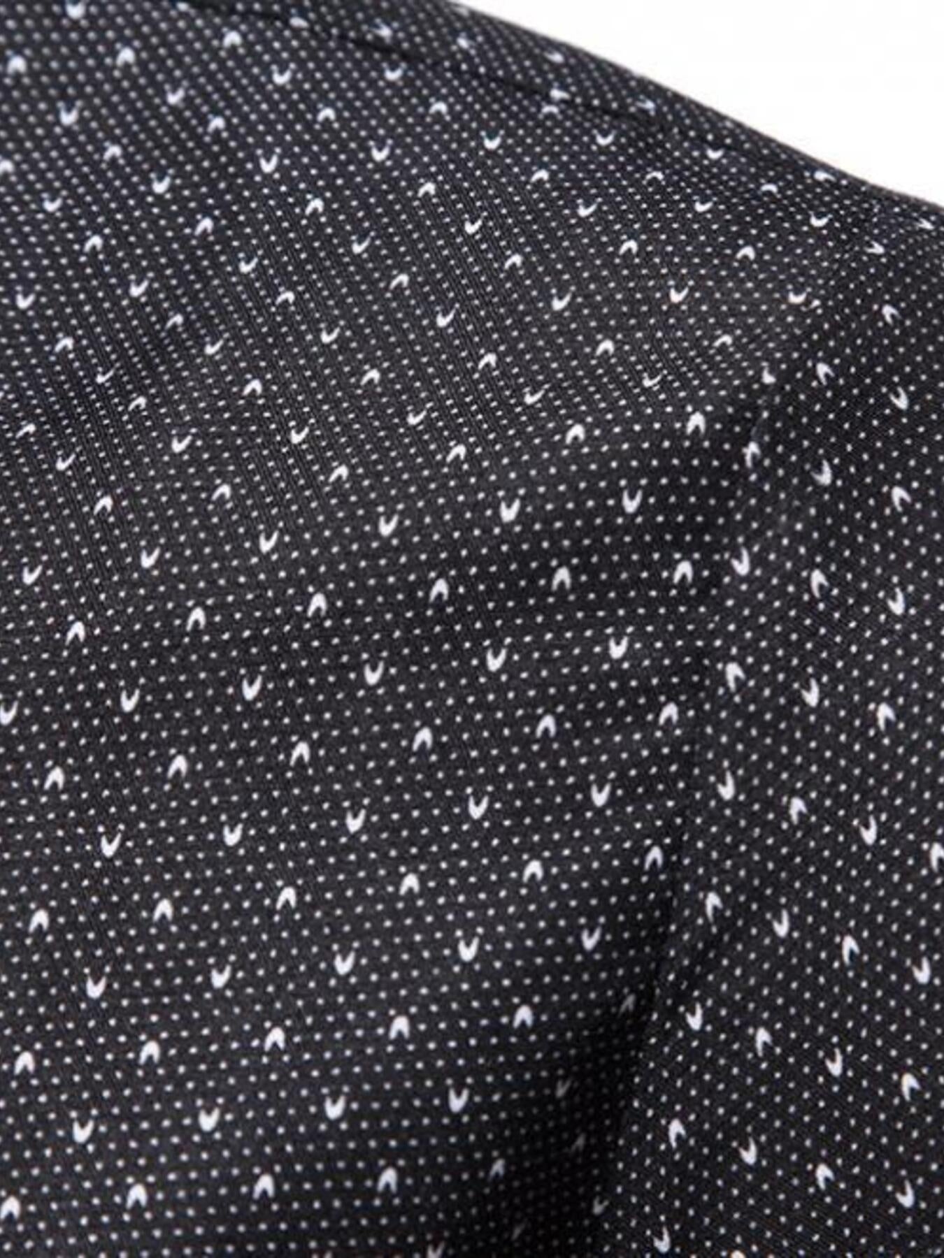 Black cotton slim fit shirt with micro-dots and subtle curved details.
