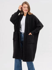Black oversized knit cocoon cardigan with pockets and ribbed cuffs.