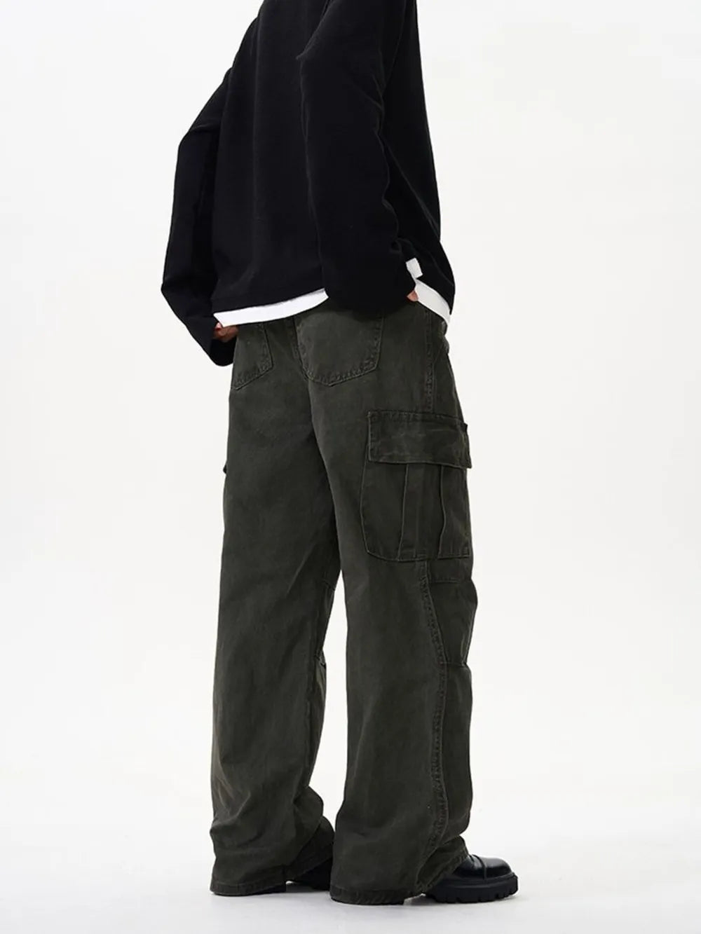 Tailored cargo pants in military green with versatile pockets and a relaxed fit.