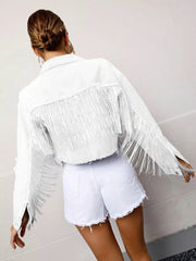 White denim cropped trucker jacket with fringe detail and frayed hem.
