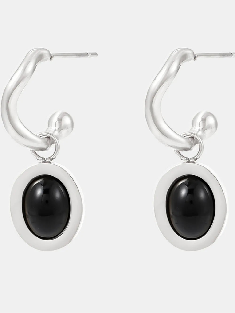 Sculptural hoop earrings with steel setting and black agate inset.