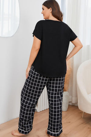 Black grid-print lounge set with Henley top and relaxed fit pants.