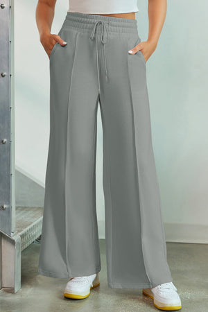 Heather gray palazzo joggers with center seam detail and drawstring waist.