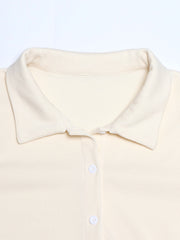 Cream ribbed knit lounge set top with collar and buttons.