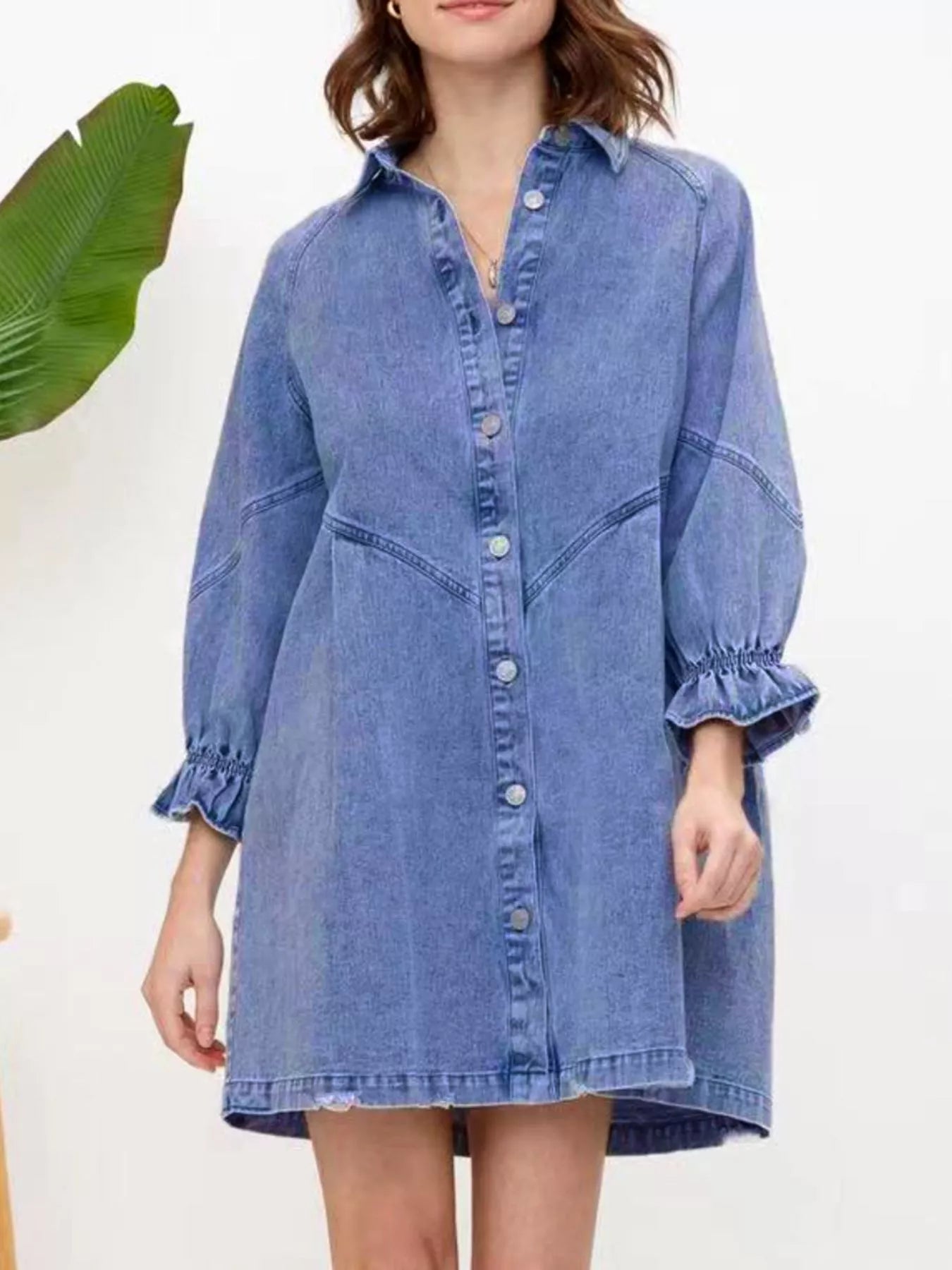 Dusty blue denim button-down dress with ruffled cuffs and a collared neckline.