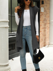 Sleeveless knit cardigan vest in dark gray with textured details and ribbed trim.