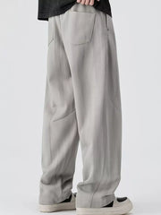 Light gray jogger pants with a drawstring and back pocket detail.