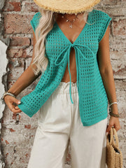Turquoise open-knit sleeveless cardigan with tie-front detail and V-neck.