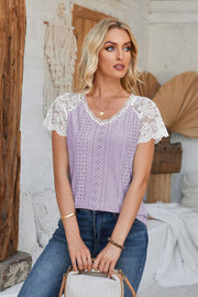 Lavender eyelet raglan blouse with white lace short sleeves and V-neck.