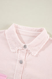 Blush pink corduroy shacket with raw edge collar and button front detail.