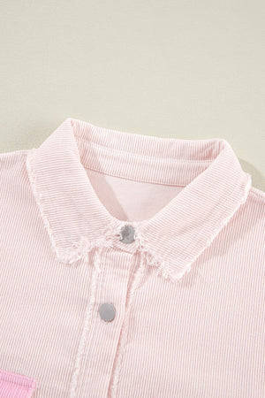 Blush pink corduroy shacket with raw edge collar and button front detail.