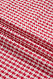 Strawberry gingham checkered maternity overshirt in textured polyester