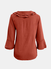 Orange-red linen blouse with ruffled neckline and flared 3/4 sleeves