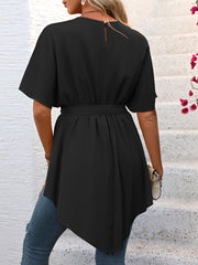 Black asymmetrical hemline blouse with tie waist and short sleeves, shown from the back.