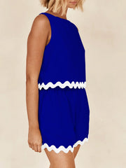 Royal blue scalloped edge tank and short co-ord set with white trim.