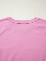 Pink cotton crew-neck sweatshirt with embroidered heart detail