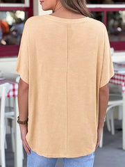 Apricot relaxed fit V-neck tee, 100% polyester, short sleeves, basic casual style.
