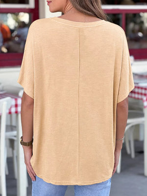 Apricot relaxed fit V-neck tee, 100% polyester, short sleeves, basic casual style.