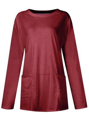 Burgundy relaxed fit tunic with crew neck, long sleeves, and two patch pockets.