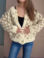Checkerboard knit button-up cardigan in taupe and cream acrylic with button details.