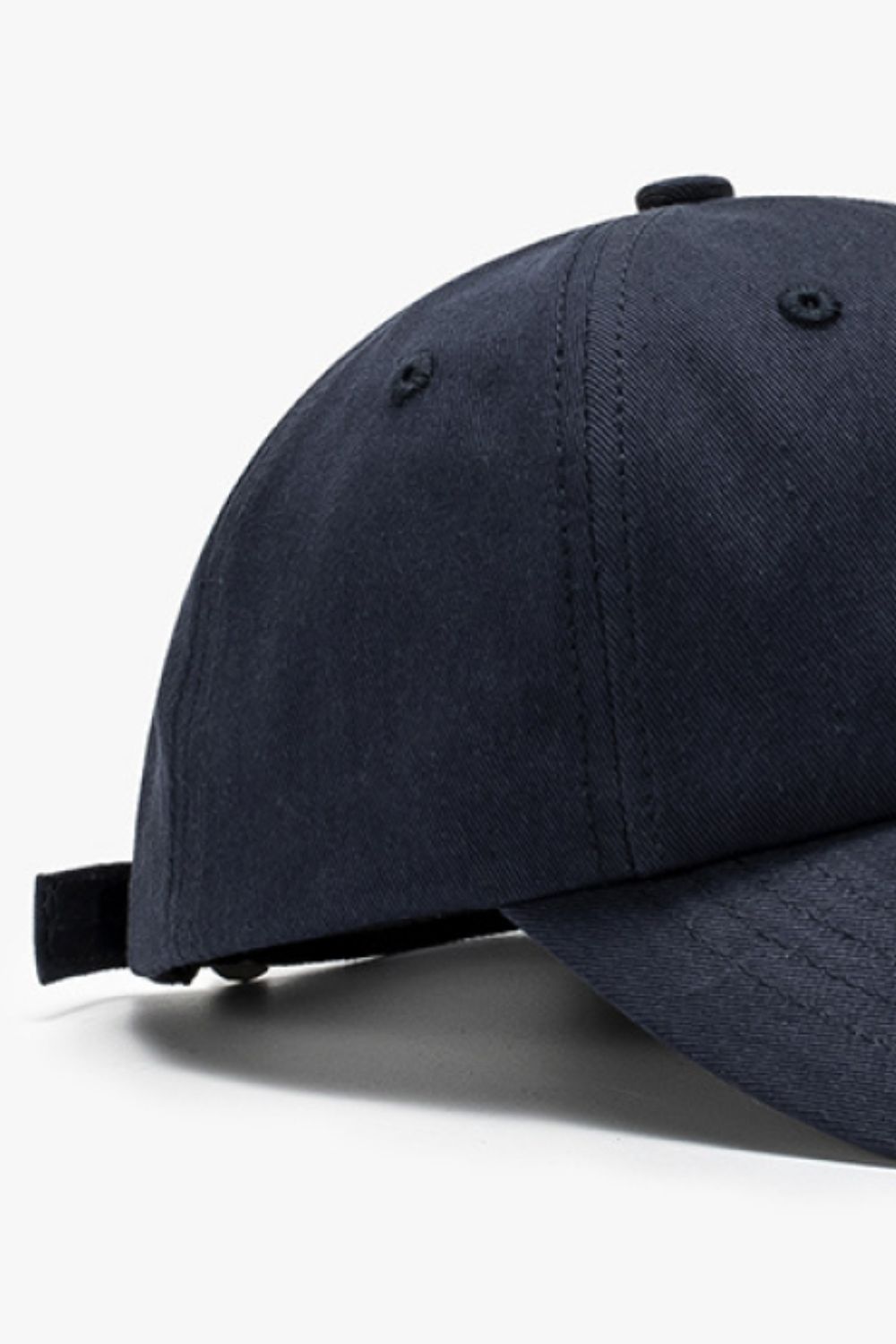 Navy cotton baseball cap with adjustable strap detail