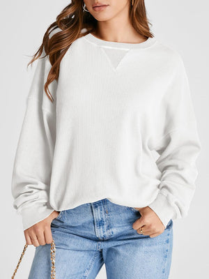 White waffle knit raglan sleeve sweatshirt with crew neck and V-stitch detail.