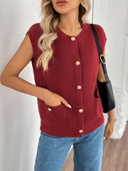 Ribbed knit vest in rust with gold buttons and pocket details.