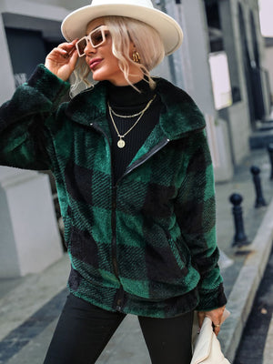 Green plaid sherpa zip-up jacket with a collared neckline and fuzzy texture.