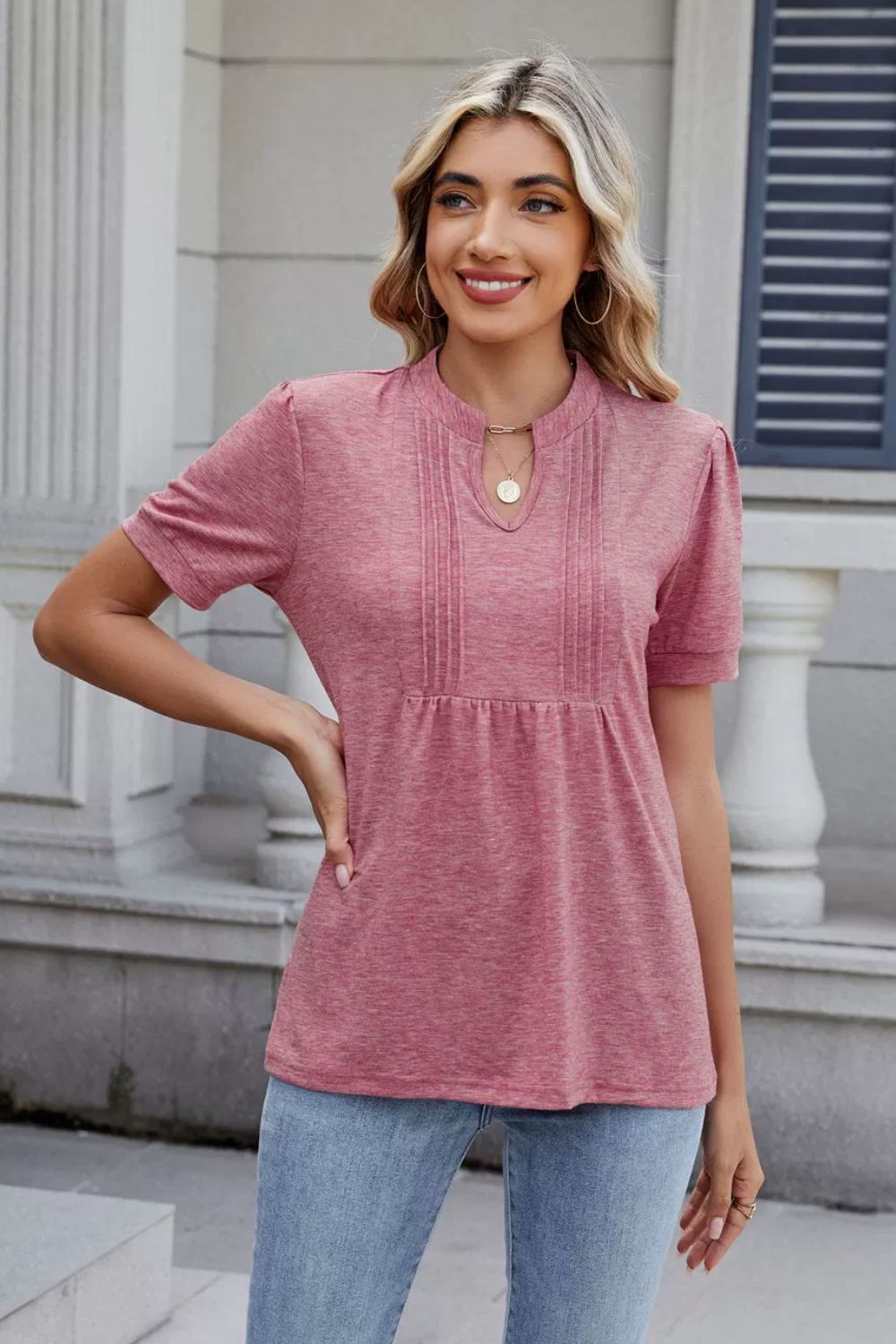 Dusty pink short sleeve blouse with pleated yoke and keyhole neckline