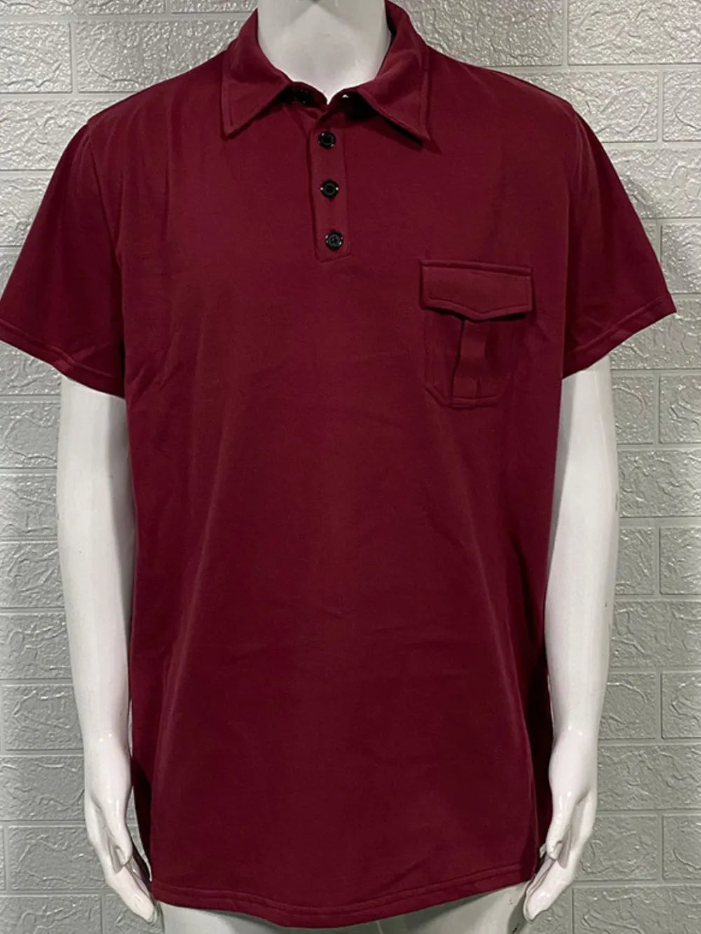 Burgundy acrylic polo shirt with short sleeves and a utility chest pocket.