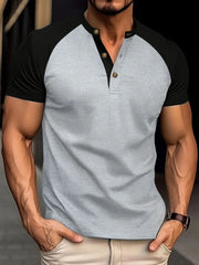 Contrast raglan henley polo shirt in gray with black sleeves and gold button detail