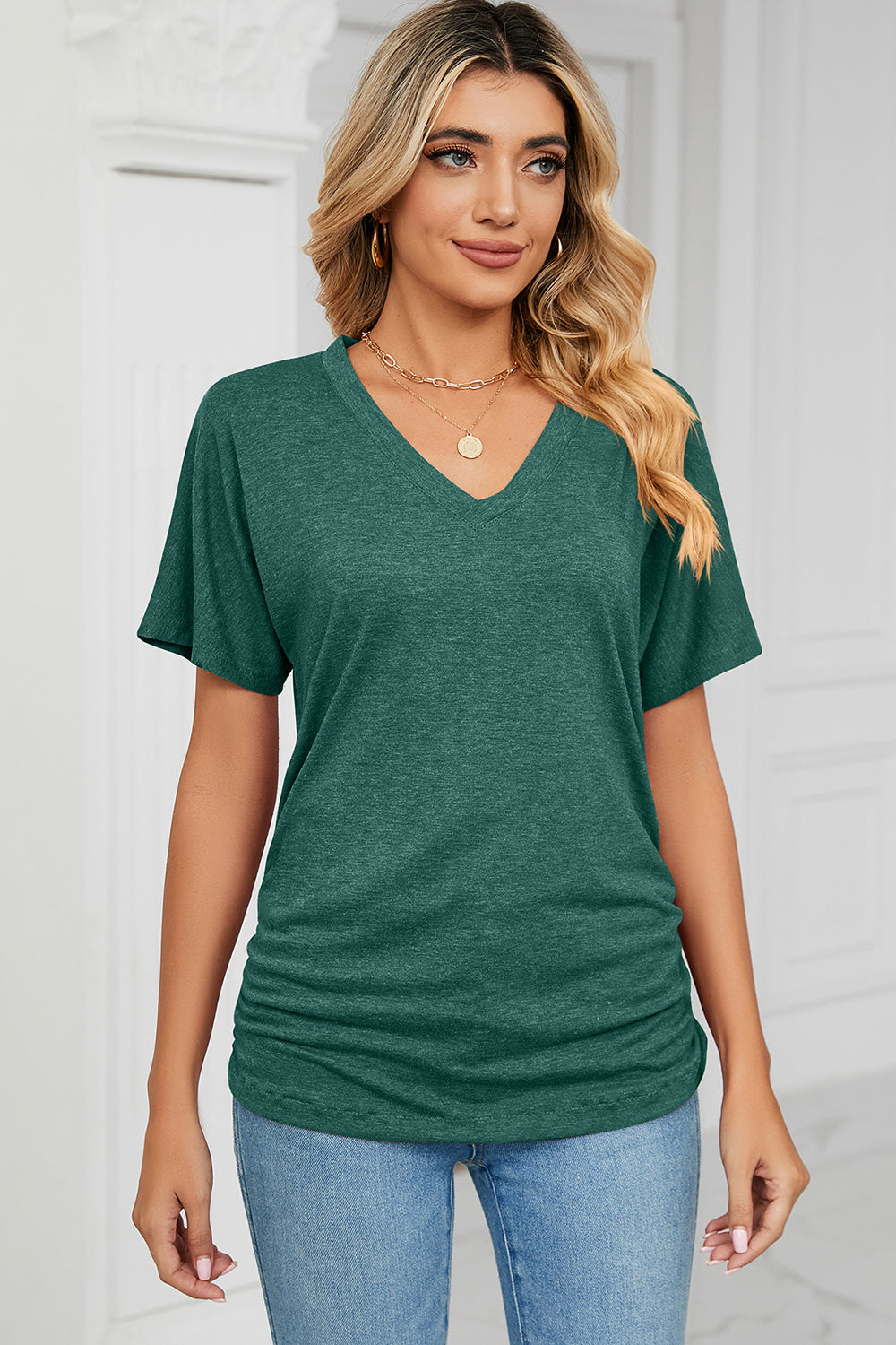 Dark Green V-neck tee with short dolman sleeves and ruched side detail.