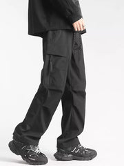 Men's black relaxed fit cargo sweatpants with ankle drawstring and zippered pocket detail.