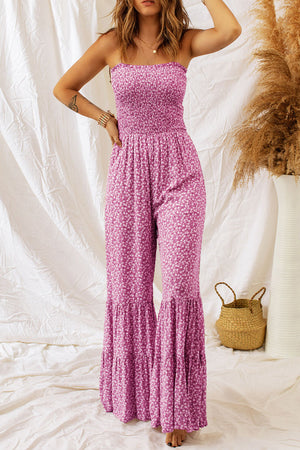 Hot Pink floral smocked bodice flare-leg jumpsuit with tiered ruffle hem.