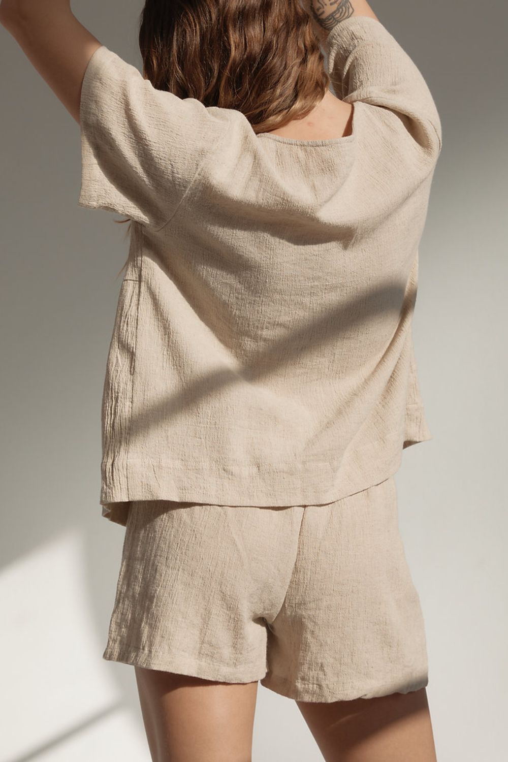 Beige cotton textured open-front top and shorts set