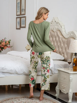 Botanical print lounge set with long sleeve top in Matcha Green and floral pants.