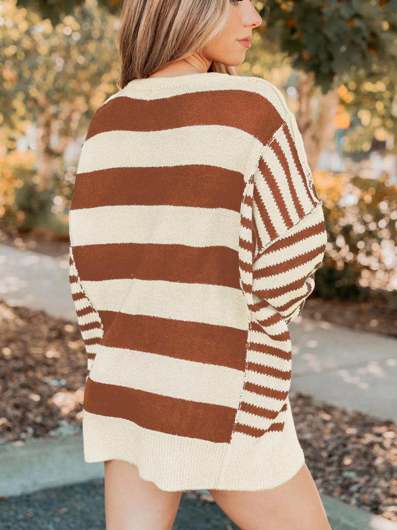 Patchwork drop shoulder sweater in caramel and cream stripes with baggy fit.
